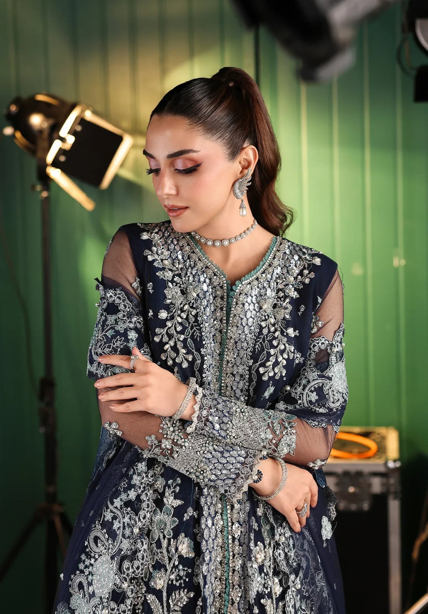 Skyfall by Elaf Stardom ’25 features hand-embroidered poly-net panels, detailed dupatta, and raw silk inner — perfect for formal evenings and festive elegance.