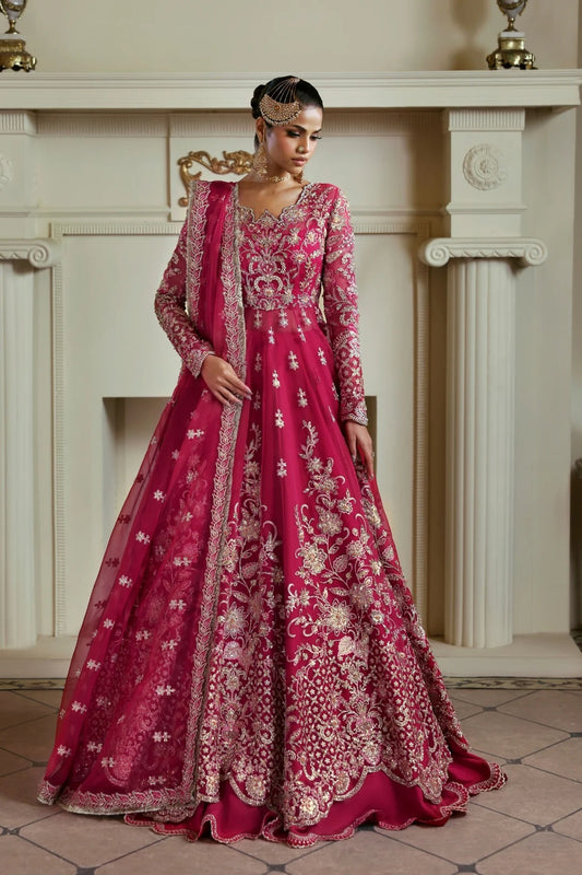 Opulent organza ensemble with hand-embellished panels, embroidered dupatta, lehenga border, Russian grip inner, and raw silk lehenga fabric. Ideal for events.
