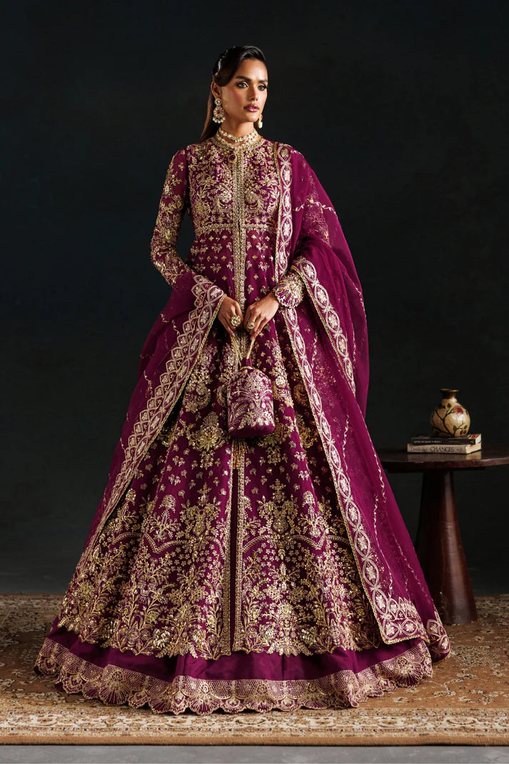 Elegant organza embroidered lehenga with hand embellished panels, sleeves & dupatta. Includes raw silk lehenga and Russian grip inner fabric.