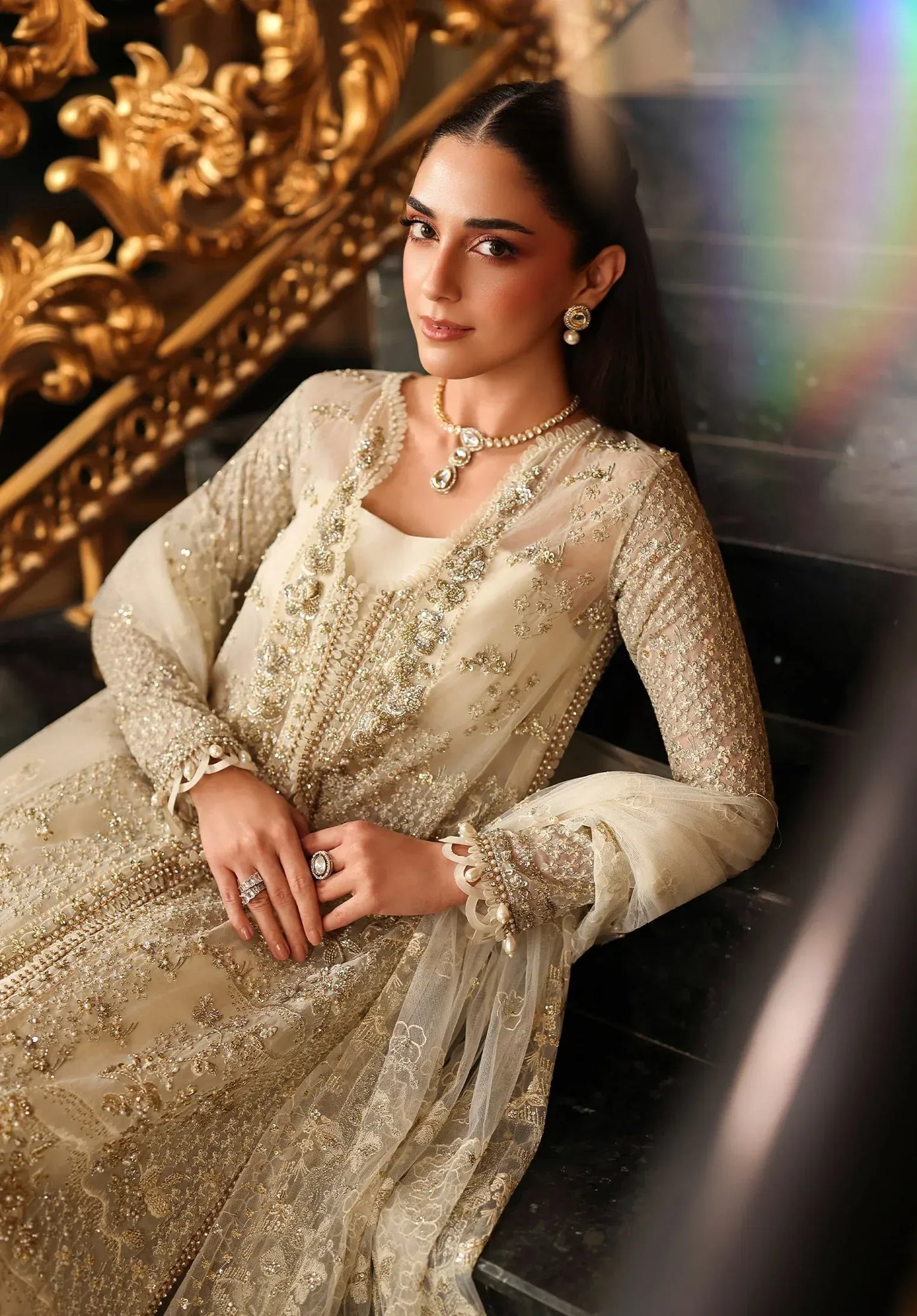 Celestia by Elaf Stardom ’25 features hand-embellished organza panels, embroidered dupatta, and raw silk inner — a timeless choice for refined elegance.