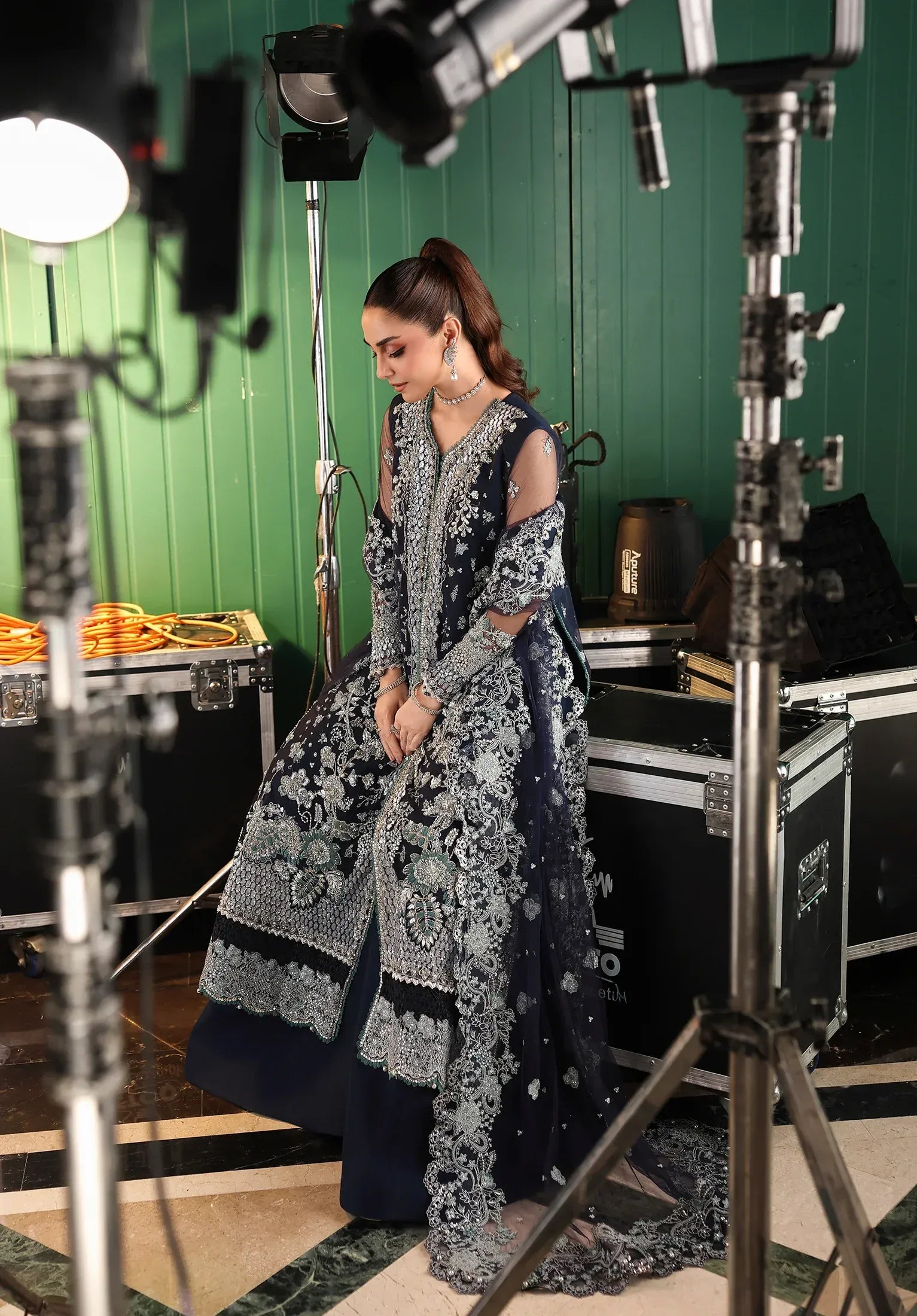 Skyfall by Elaf Stardom ’25 features hand-embroidered poly-net panels, detailed dupatta, and raw silk inner — perfect for formal evenings and festive elegance.