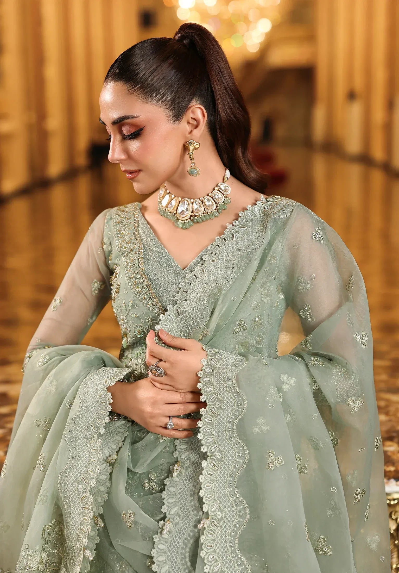 Lime Light by Elaf Stardom ’25 features hand-embroidered organza panels, elegant dupatta, and raw silk inner — perfect for festive gatherings and formal occasions.