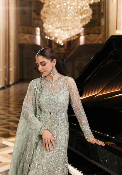 Elaf Stardom Diana – Hand Embellished 3Pc Poly Net SetDiana by Elaf Stardom ’25 features hand-embroidered poly-net panels, elegant dupatta, and raw silk inner — perfect for festive occasions and timeless sophistication.