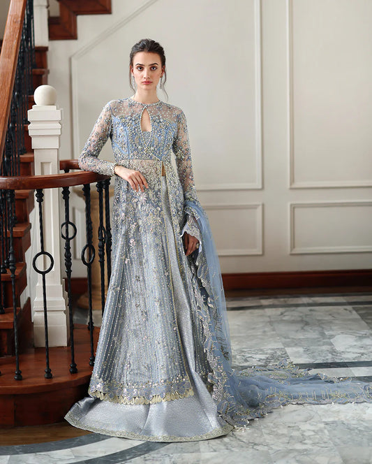 Hand-embellished embroidered net shirt with sequins and pearls, paired with a dyed jamawar lehenga and embroidered net dupatta—ideal for weddings and festive wear.