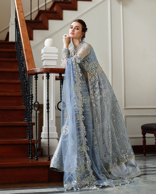Hand-embellished embroidered net shirt with sequins and pearls, paired with a dyed jamawar lehenga and embroidered net dupatta—ideal for weddings and festive wear.