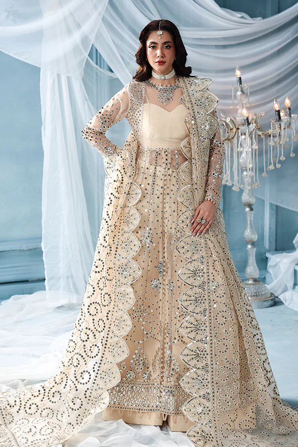 Warm ivory organza unstitched suit with silver embroidery, raw silk shahrara and luxuriously embellished dupatta pallus for festive luxury wear occasions.