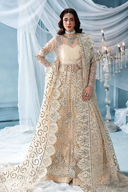 Warm ivory organza unstitched suit with silver embroidery, raw silk shahrara and luxuriously embellished dupatta pallus for festive luxury wear occasions.