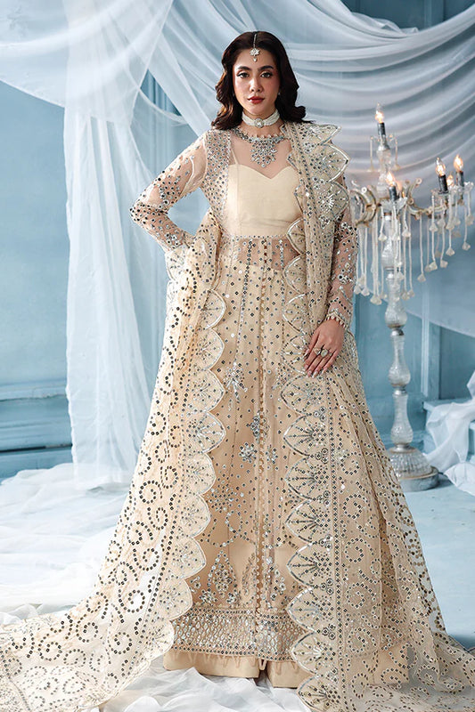 Warm ivory organza unstitched suit with silver embroidery, raw silk shahrara and luxuriously embellished dupatta pallus for festive luxury wear occasions.