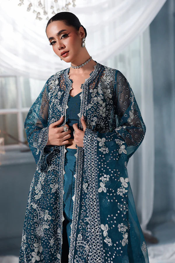 Deep teal organza unstitched suit with silver embroidery, raw silk shahrara and embroidered dupatta, designed for women who love timeless elegance wear.