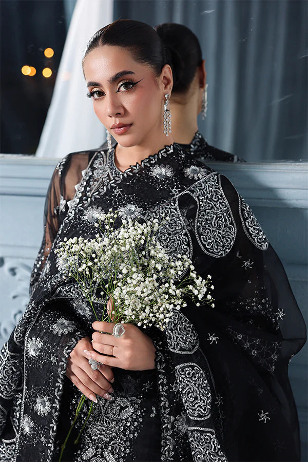 Black organza unstitched suit with celestial embroidery, raw silk shahrara and heavily embellished dupatta pallus for luxurious evening wear occasions.