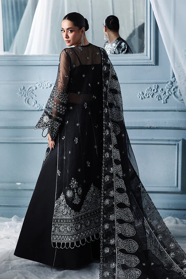 Black organza unstitched suit with celestial embroidery, raw silk shahrara and heavily embellished dupatta pallus for luxurious evening wear occasions.