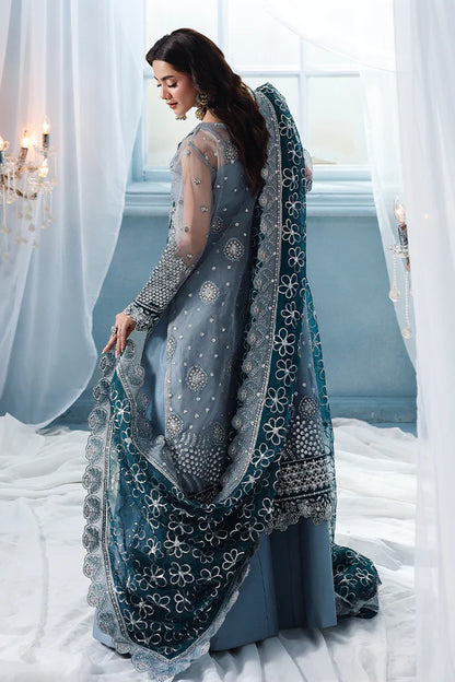 Slate grey organza unstitched suit with majestic embroidery, contrast silk details, raw silk shahrara and embellished dupatta for festive luxury wear.