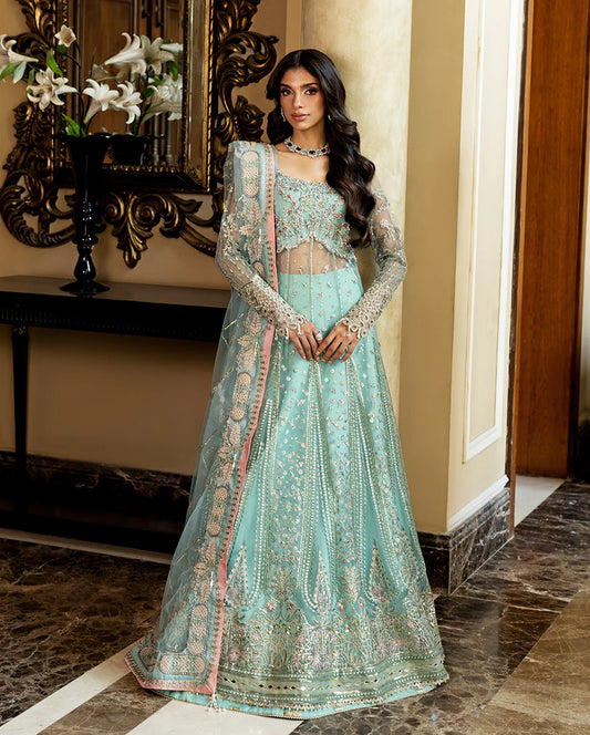 Luxury wedding formal featuring hand-embroidered sequined net shirt, raw silk lehenga, sequined dupatta, and exquisite mirror, golden, and organza lace finishes.