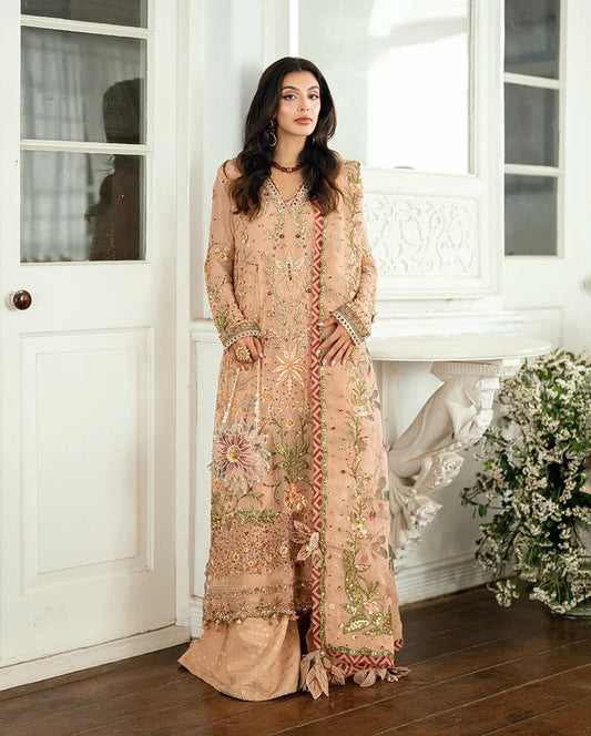 Elegant mocha chiffon suit with handwork, 3D florals, printed organza dupatta & foil silk trouser. Finished with tassels, lace & pearl detailing. Shop now!