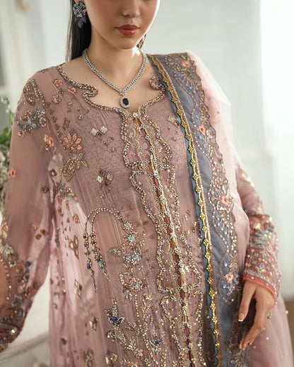 Luxury chiffon lehenga outfit with hand embellishments, sequins & pearl-detailed net dupatta. Includes jamawar lehenga & handcrafted tassels. Shop now!