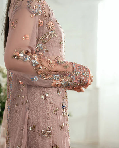 Luxury chiffon lehenga outfit with hand embellishments, sequins & pearl-detailed net dupatta. Includes jamawar lehenga & handcrafted tassels. Shop now!