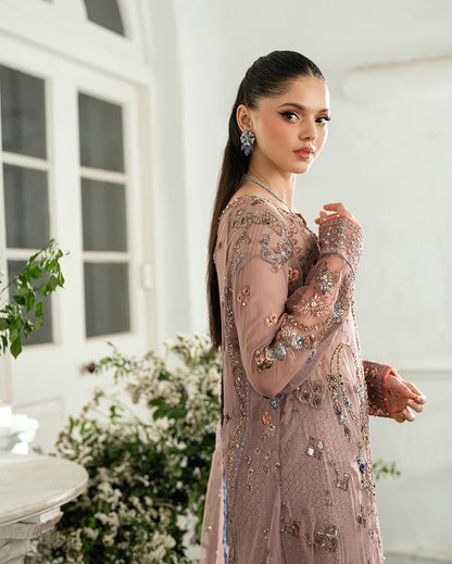 Luxury chiffon lehenga outfit with hand embellishments, sequins & pearl-detailed net dupatta. Includes jamawar lehenga & handcrafted tassels. Shop now!