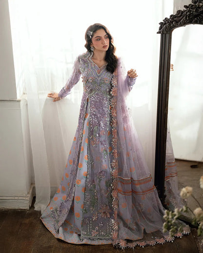 Shop this chiffon suit with hand embellishments, 3D florals, sequinned net dupatta & printed silk trouser. Includes tassels, lace & pearl detailing.