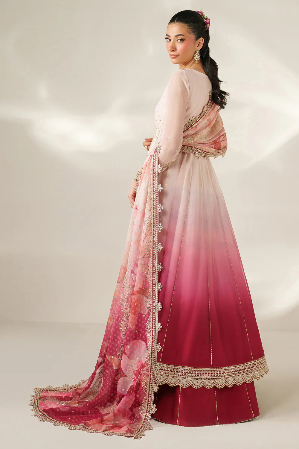 Expertly crafted embroidered chiffon ensemble with digitally printed yoke, panels, sleeves, detailed borders, elegant dupatta, and dyed raw silk bottom.