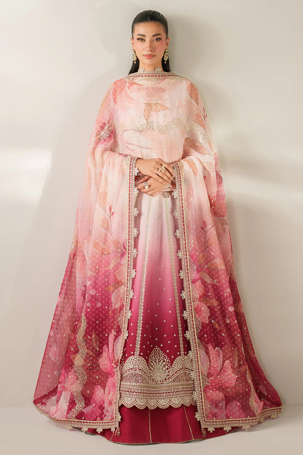 Expertly crafted embroidered chiffon ensemble with digitally printed yoke, panels, sleeves, detailed borders, elegant dupatta, and dyed raw silk bottom.