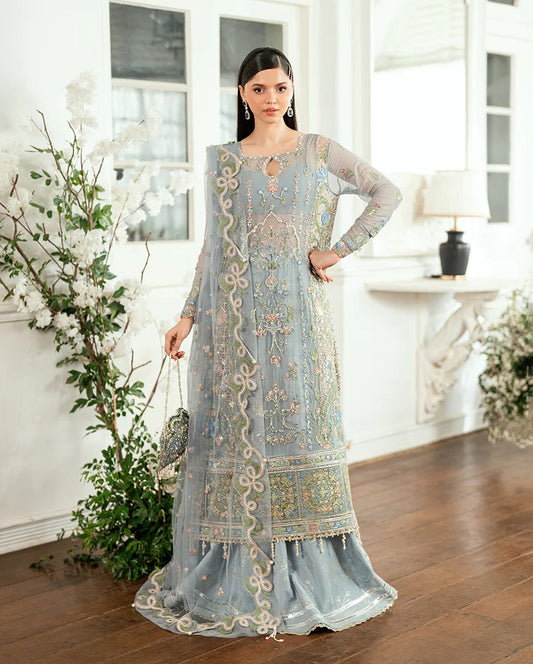 Shop this ice blue chiffon suit with pearl & sequin work, sequinned net dupatta, foil silk trouser & handcrafted tassels. Perfect for festive & formal occasions!