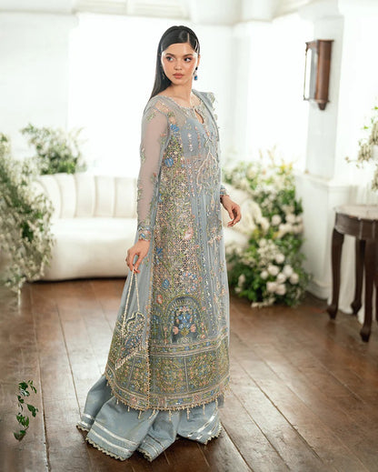 Shop this ice blue chiffon suit with pearl & sequin work, sequinned net dupatta, foil silk trouser & handcrafted tassels. Perfect for festive & formal occasions!
