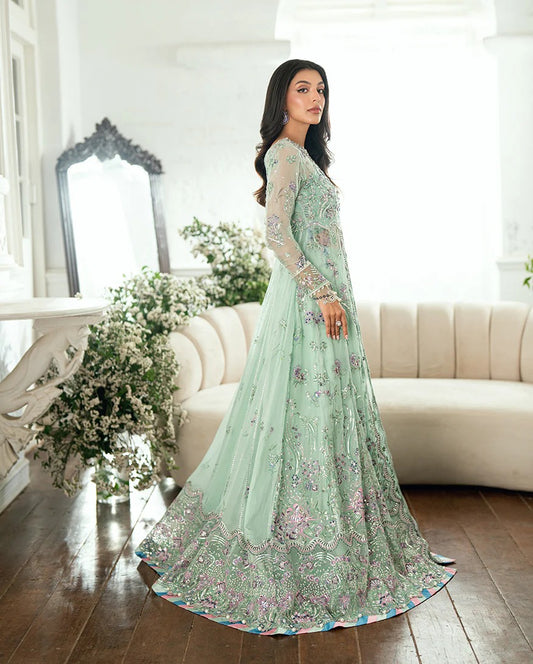 Elegant aqua chiffon suit with printed panels, sequinned organza borders, foil dupatta & raw silk trouser or jamawar lehenga. Finished with pearls & lace.