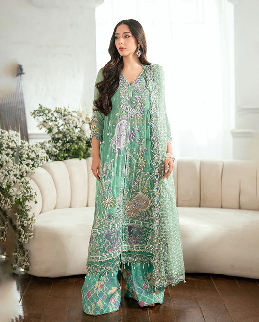 Shop this sea green chiffon suit with hand embellishments, sequinned net dupatta, raw silk trousers, and handcrafted tassels. Perfect for festive occasions!