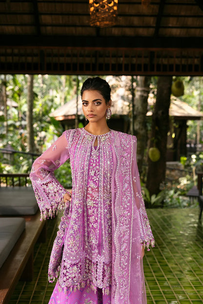 Stunning lilac 3-piece unstitched set in net & organza with hand and machine embroidery, including printed lehnga and dupatta, ideal for weddings and festive occasions.
