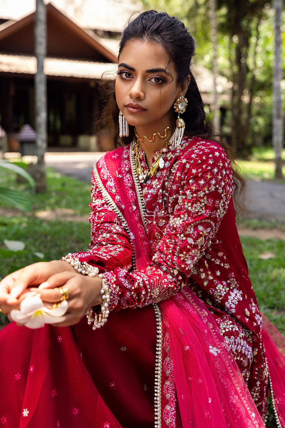 Stunning fuchsia pink 3-piece unstitched set in raw silk & net with hand and machine embroidery, including embroidered trouser and dupatta for festive occasions.
