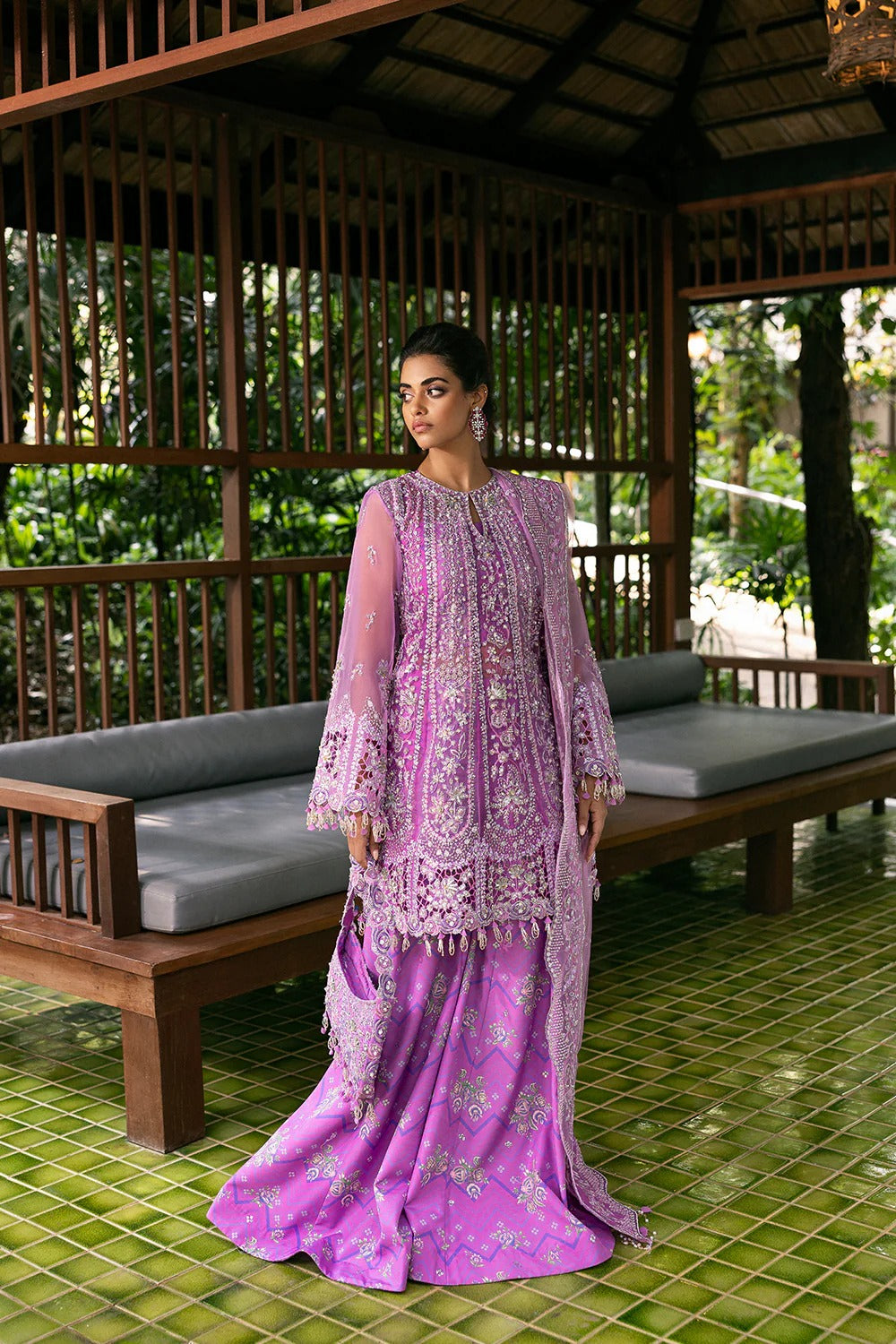 Stunning lilac 3-piece unstitched set in net & organza with hand and machine embroidery, including printed lehnga and dupatta, ideal for weddings and festive occasions.
