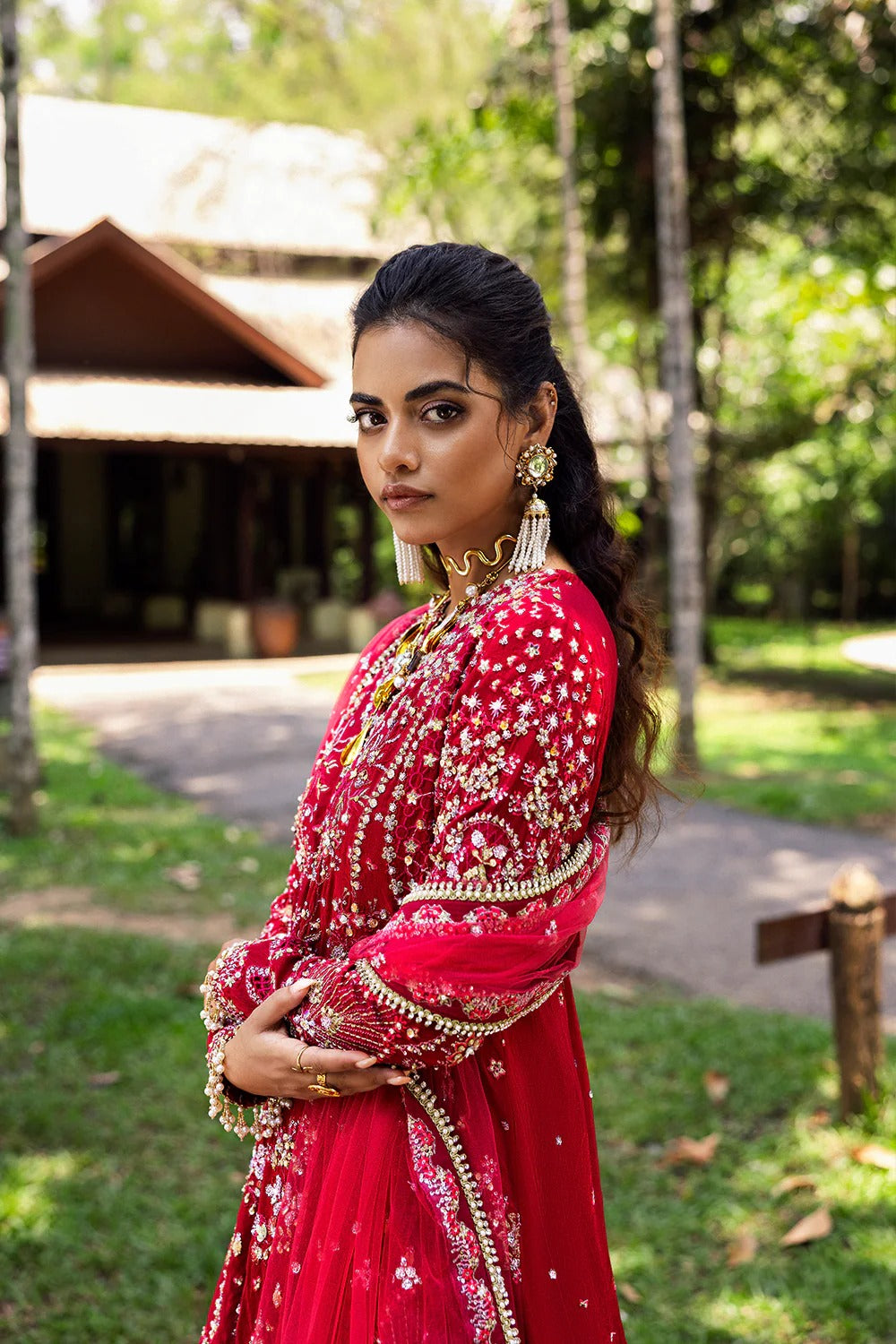 Stunning fuchsia pink 3-piece unstitched set in raw silk & net with hand and machine embroidery, including embroidered trouser and dupatta for festive occasions.