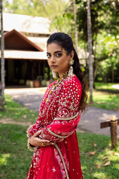 Stunning fuchsia pink 3-piece unstitched set in raw silk & net with hand and machine embroidery, including embroidered trouser and dupatta for festive occasions.