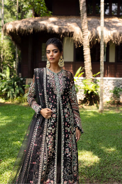 Elegant black 3-piece unstitched set in organza & net with hand and machine embroidery, including raw silk trouser and dupatta, perfect for weddings and festive events.