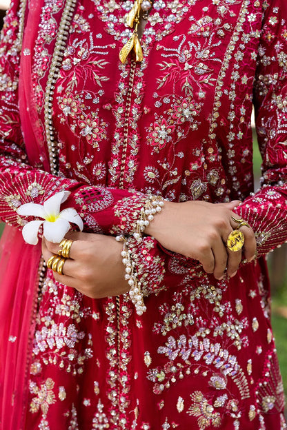 Stunning fuchsia pink 3-piece unstitched set in raw silk & net with hand and machine embroidery, including embroidered trouser and dupatta for festive occasions.