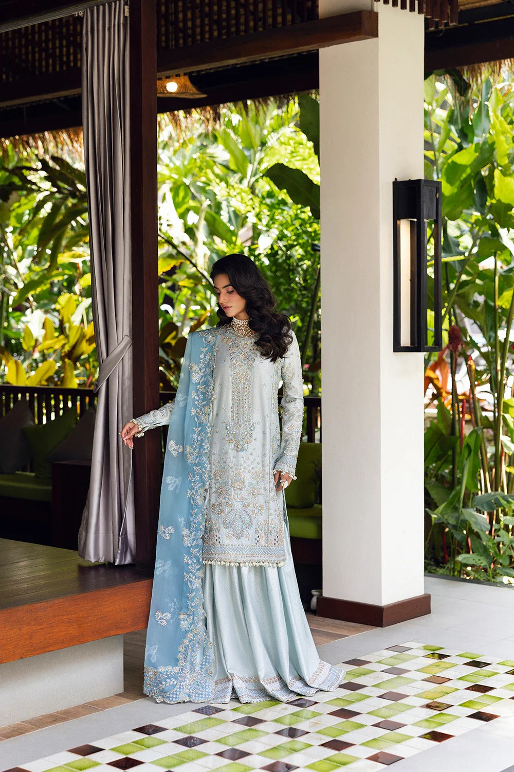 Elegant Ice Blue 3-piece unstitched set with hand & machine embellishments, perfect for weddings and festive occasions. Premium tissue & organza fabrics.