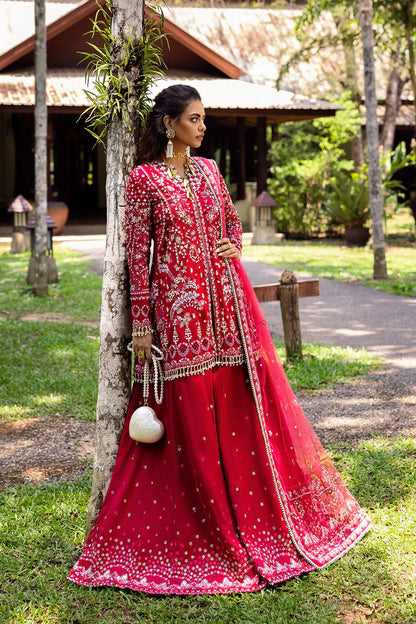 Stunning fuchsia pink 3-piece unstitched set in raw silk & net with hand and machine embroidery, including embroidered trouser and dupatta for festive occasions.