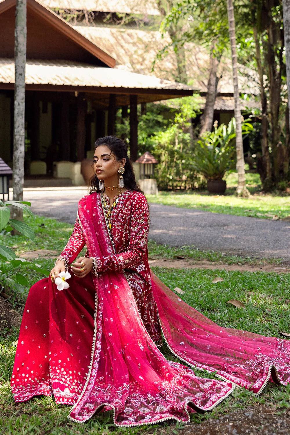 Stunning fuchsia pink 3-piece unstitched set in raw silk & net with hand and machine embroidery, including embroidered trouser and dupatta for festive occasions.