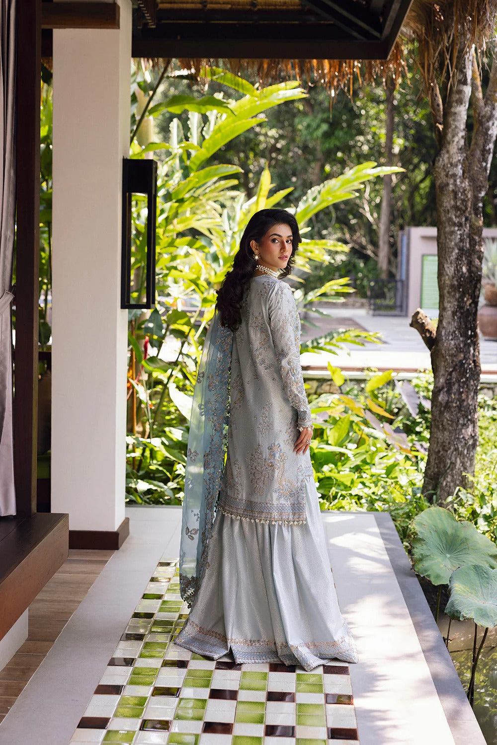 Elegant Ice Blue 3-piece unstitched set with hand & machine embellishments, perfect for weddings and festive occasions. Premium tissue & organza fabrics.