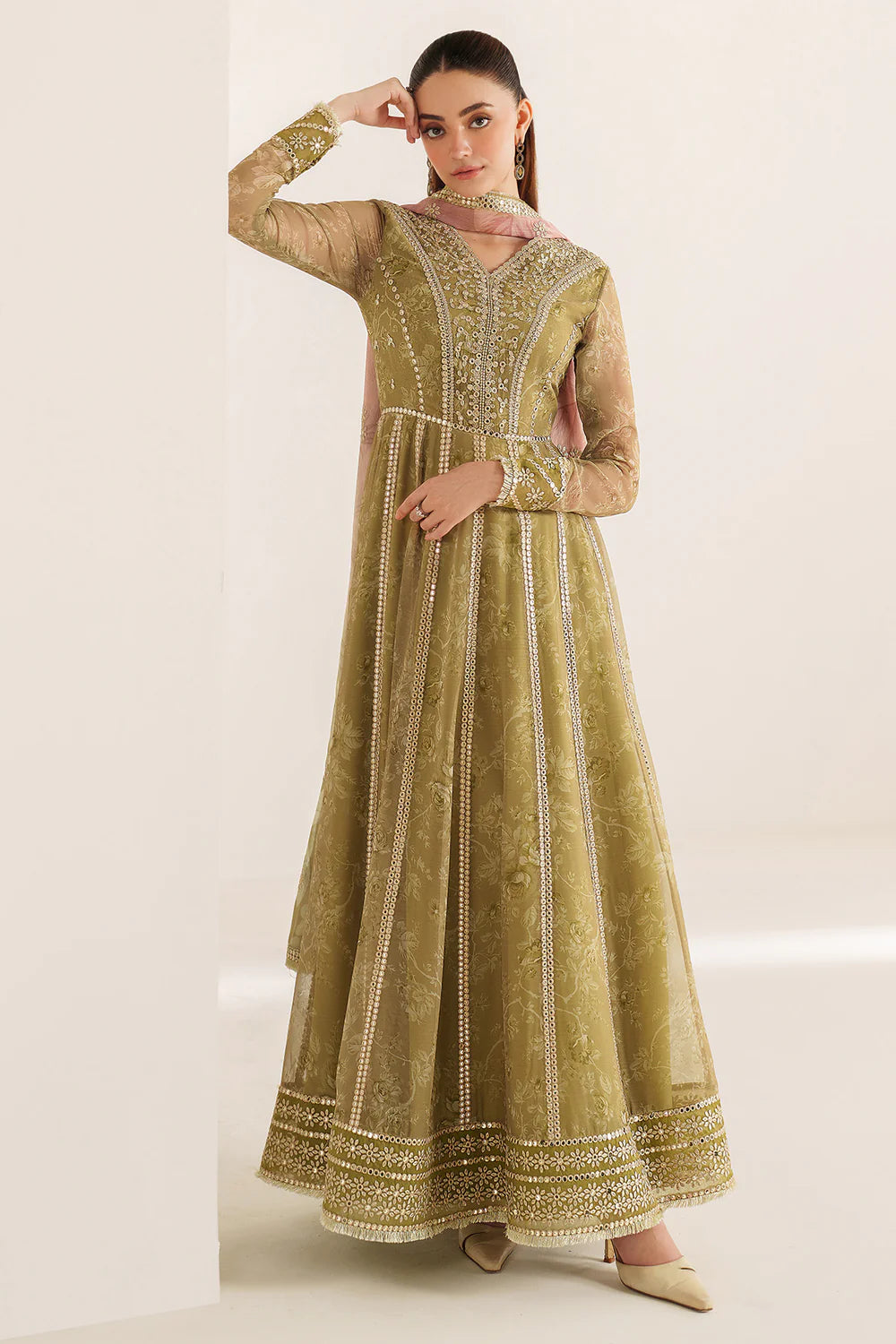 Graceful embroidered chiffon ensemble with printed sleeves, dupatta borders, and raw silk bottom. Elegant, lightweight design perfect for formal wear events.