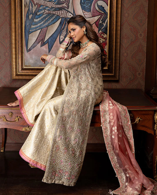Luxury organza wedding formal with sequined embroidery, lurex dupatta, hand-finished borders, and exclusive jamawar lehenga for a regal festive look.