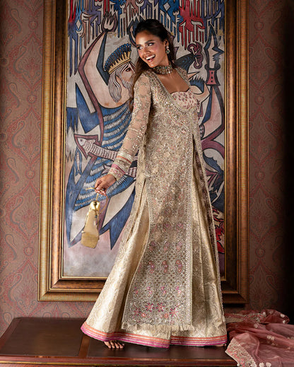 Luxury organza wedding formal with sequined embroidery, lurex dupatta, hand-finished borders, and exclusive jamawar lehenga for a regal festive look.