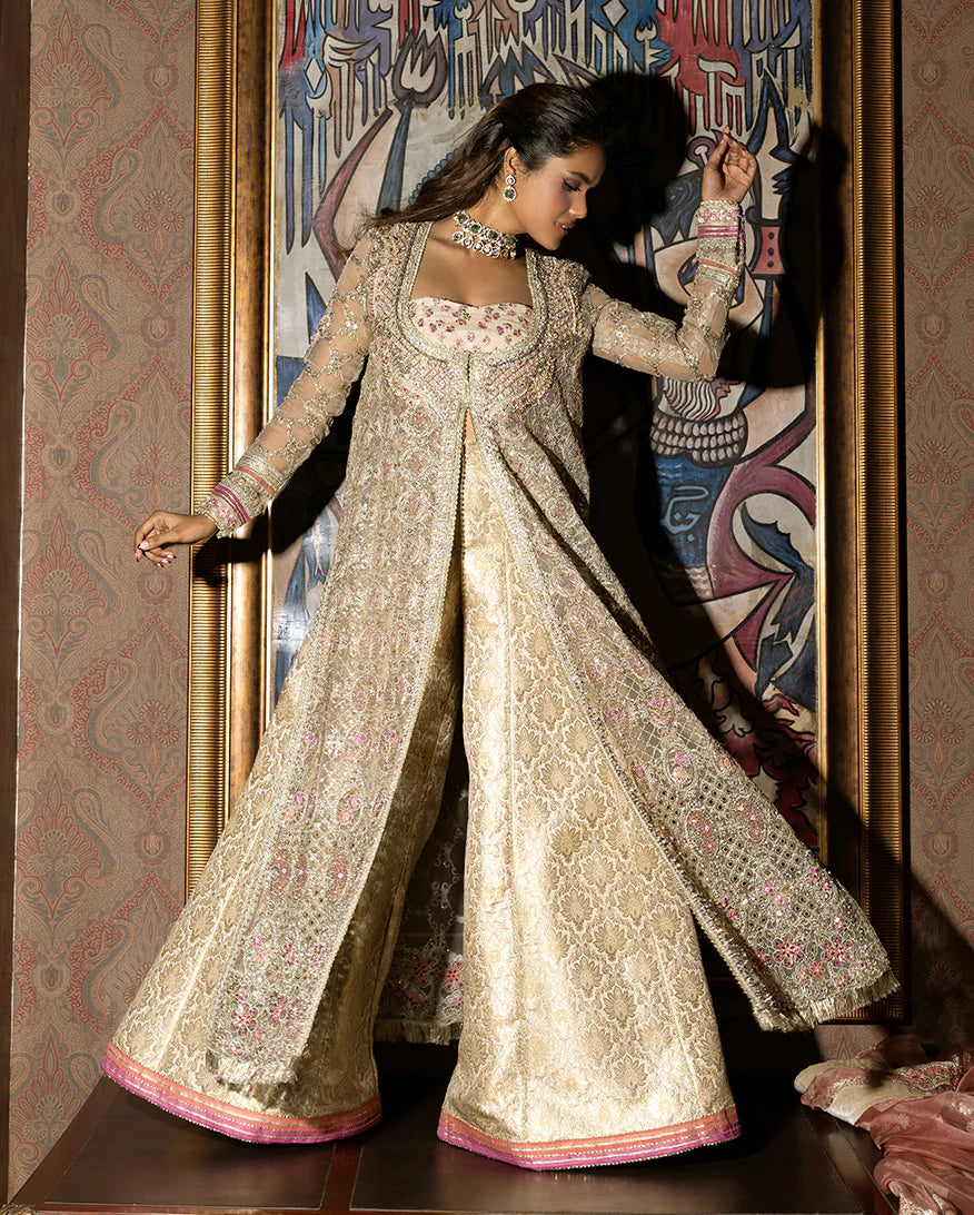 Luxury organza wedding formal with sequined embroidery, lurex dupatta, hand-finished borders, and exclusive jamawar lehenga for a regal festive look.