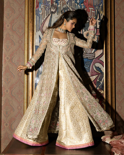 Luxury organza wedding formal with sequined embroidery, lurex dupatta, hand-finished borders, and exclusive jamawar lehenga for a regal festive look.