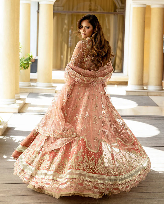 Elegant wedding formal featuring hand-embroidered sequined net shirt, organza borders, sequined dupatta, and luxurious dyed jamawar lehenga with golden lace finishes.
