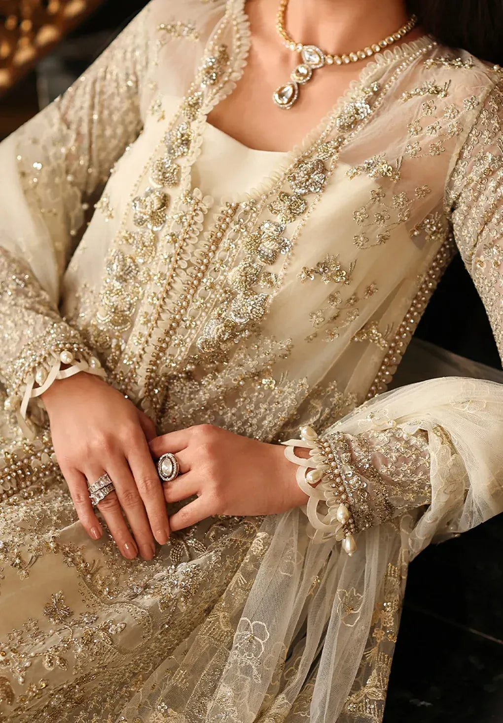 Celestia by Elaf Stardom ’25 features hand-embellished organza panels, embroidered dupatta, and raw silk inner — a timeless choice for refined elegance.