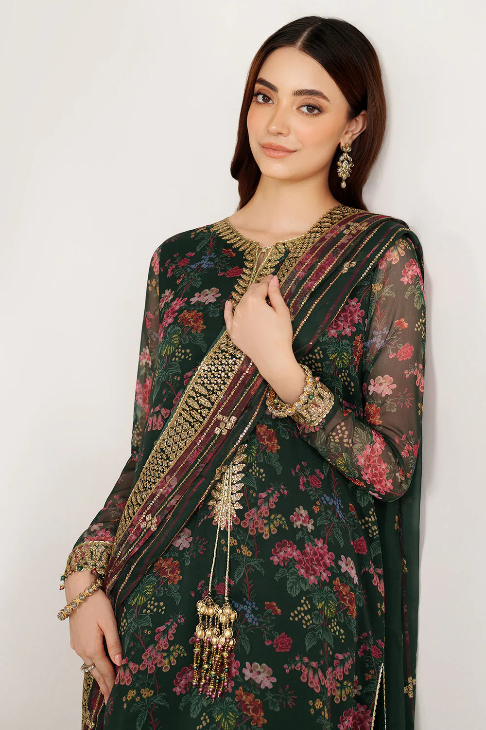 Elegant embroidered chiffon suit with printed dupatta, refined sleeve borders, and embroidered raw silk bottom for a timeless, sophisticated formal look wear.