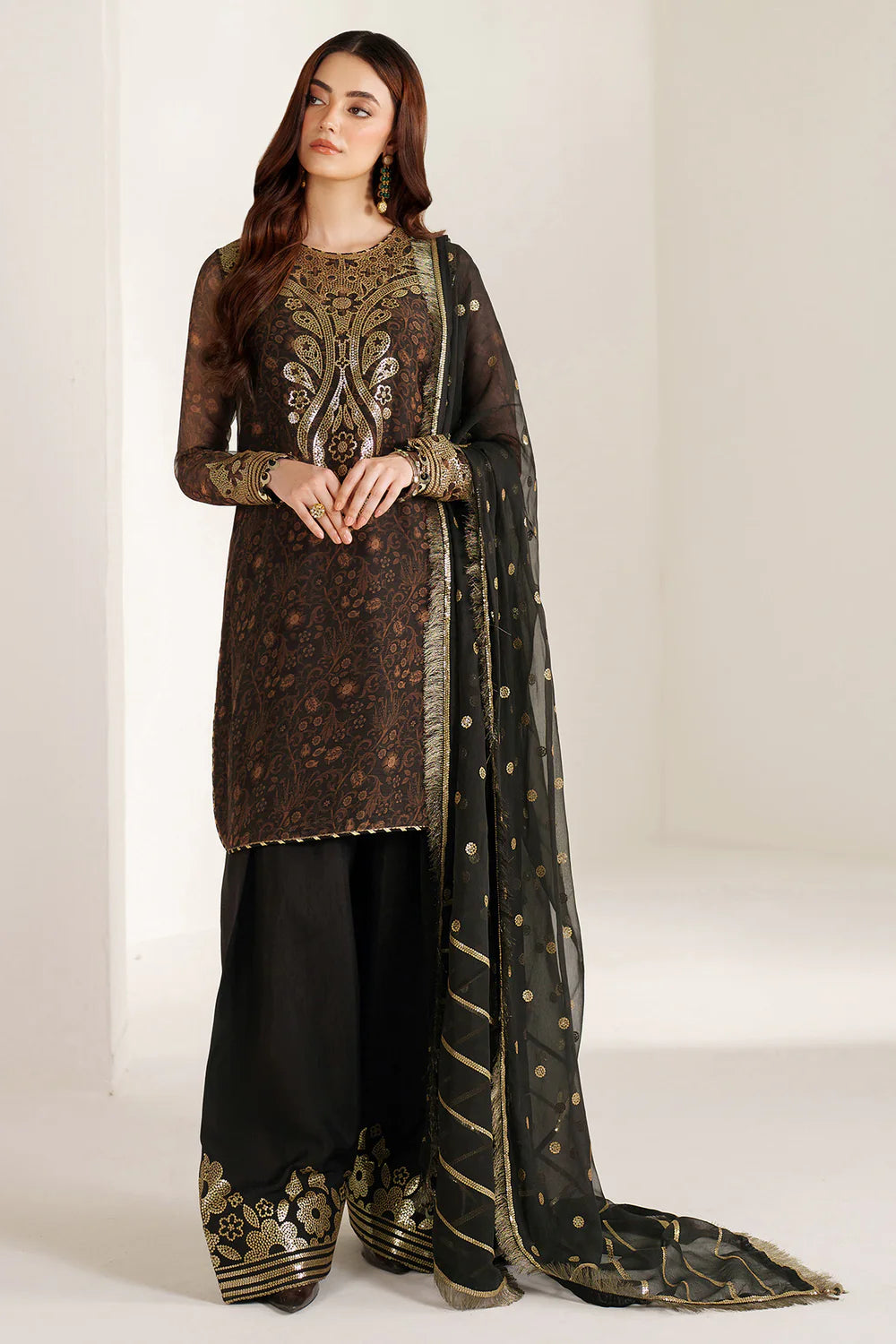 Graceful embroidered chiffon ensemble with printed front and sleeves, flowing back, rich raw silk bottom, and embroidered dupatta for timeless elegance.