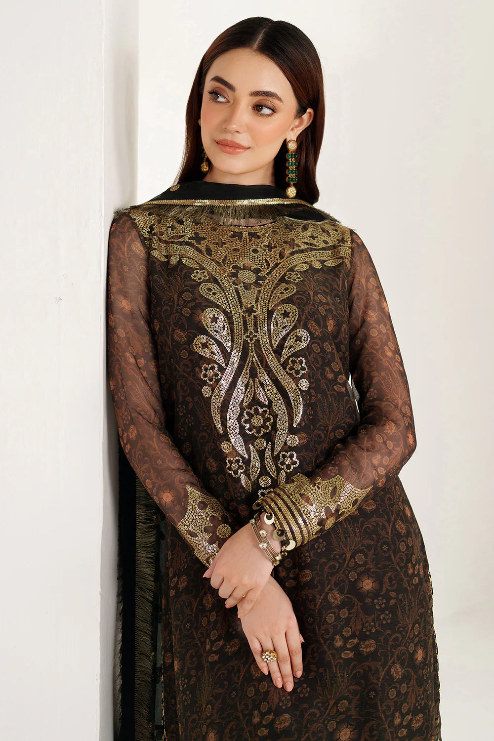Graceful embroidered chiffon ensemble with printed front and sleeves, flowing back, rich raw silk bottom, and embroidered dupatta for timeless elegance.