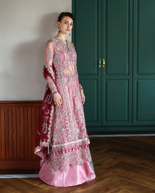 Elegant hand-embroidered net shirt with sequins & organza, paired with dyed jamawar lehenga. Ideal for weddings, festive, & special occasions.